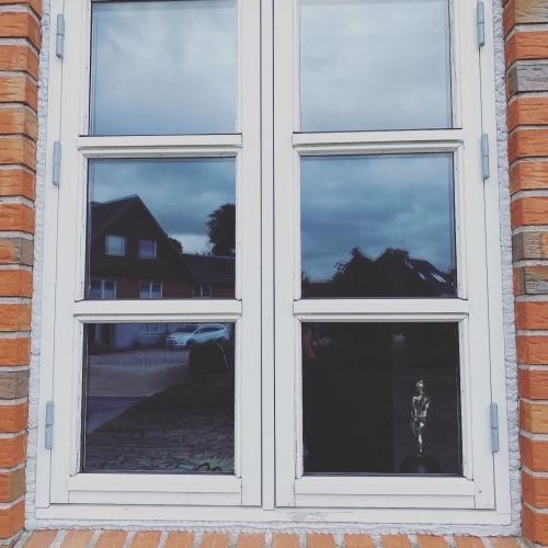 Fugning omkring vindue i Murstensfacade