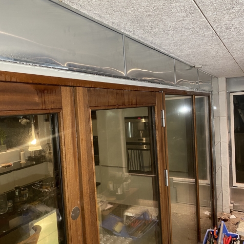 Fugning over glasparti i loft